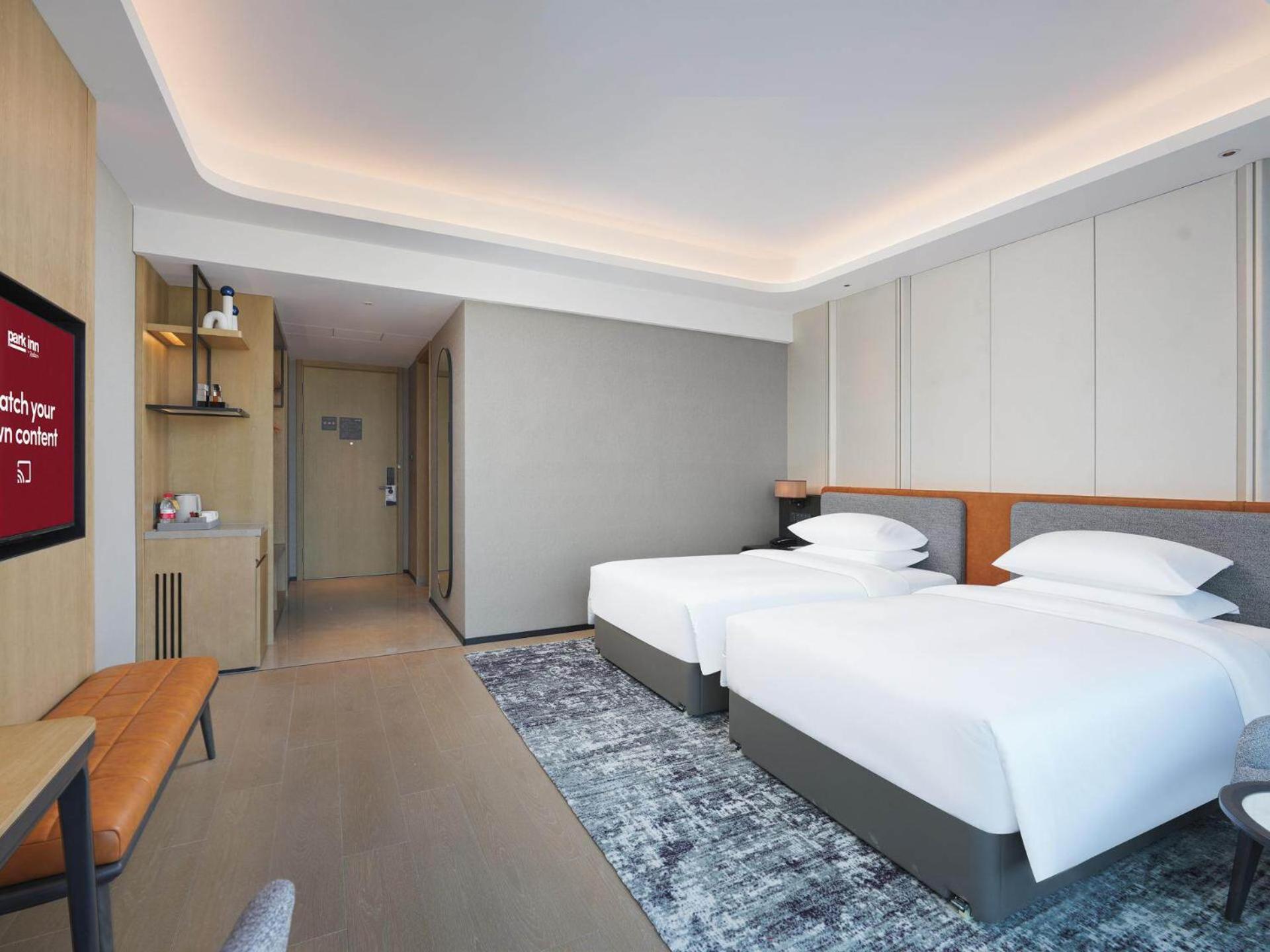 Park Inn By Radisson Nanchong Yilong Star City Plaza Exterior foto